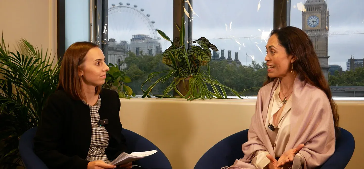 Veronica Studsgaard in a host-led IPR interview at IAMTN Summit 2026, with Westminster visible behind the speakers.